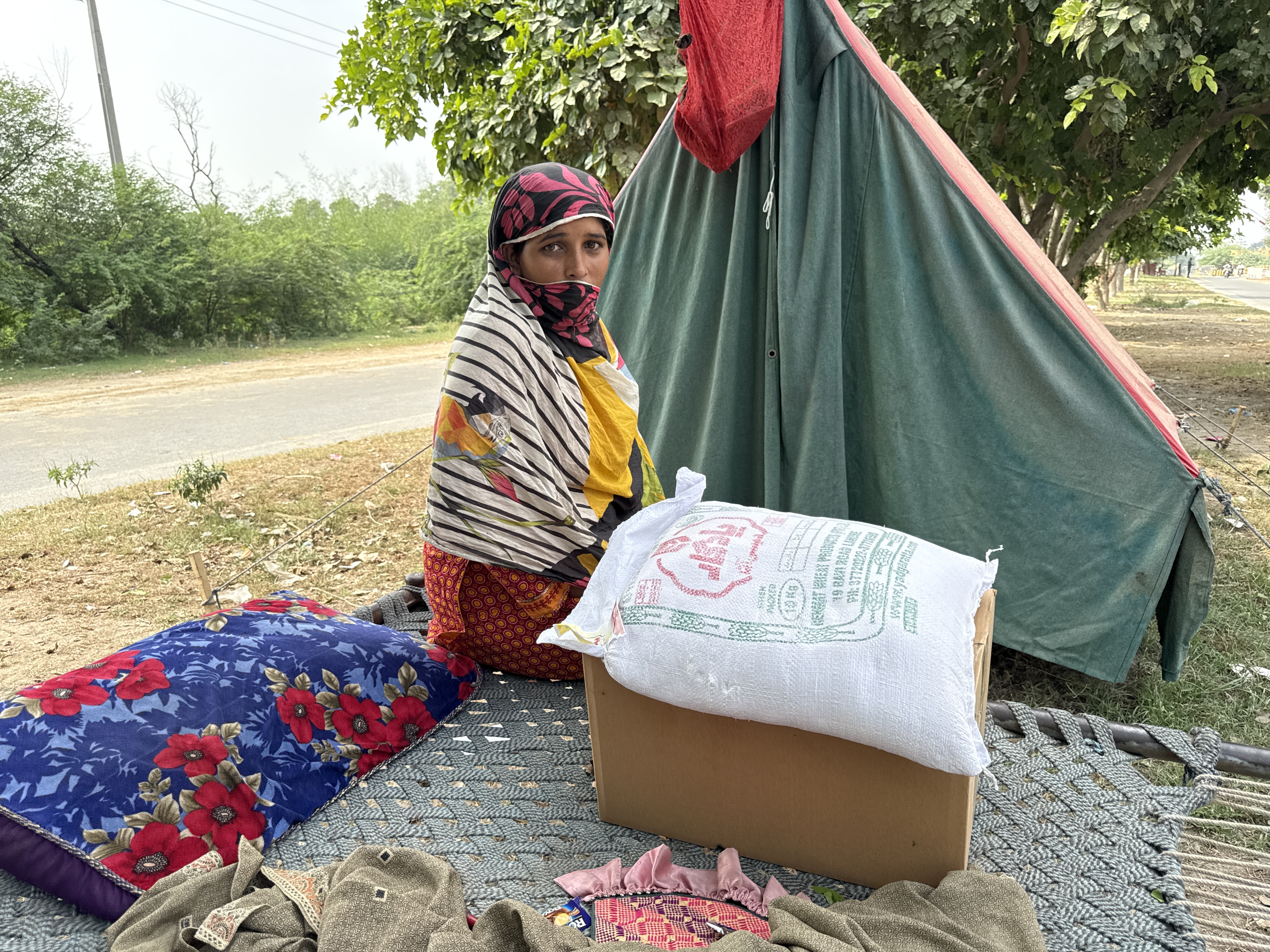 Medical camp doctor examining patient